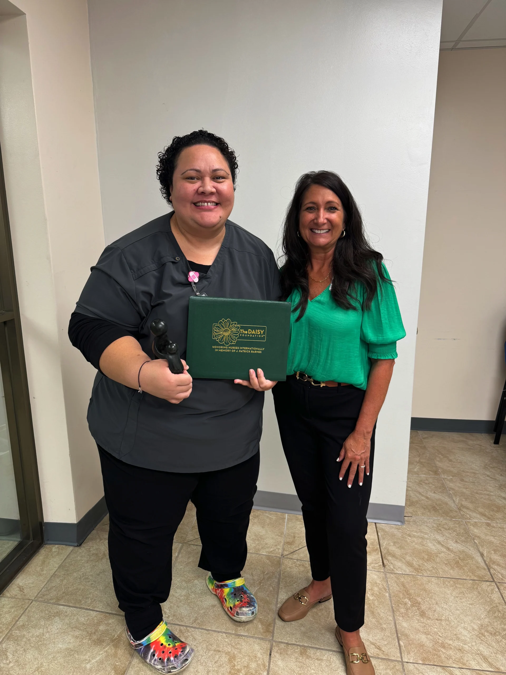 Meli Manulo pictured with Tallavera CNO and Executive Vice President Jennifer Gales.